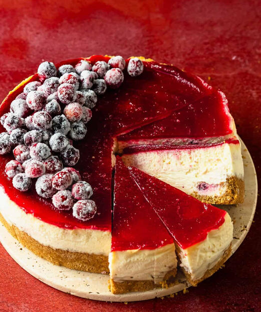 Magical Summerland Cheesecake Creamy cheesecake topped with jewel-like crystalberries in a shimmering enchanted glaze.